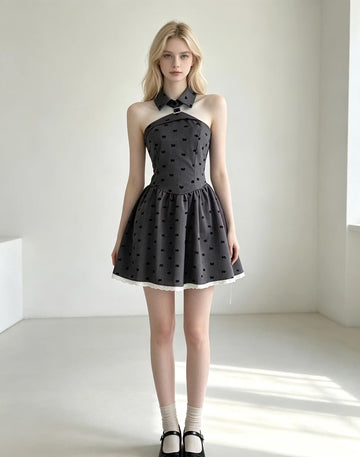 Gray halter-neck dress with black bow pattern