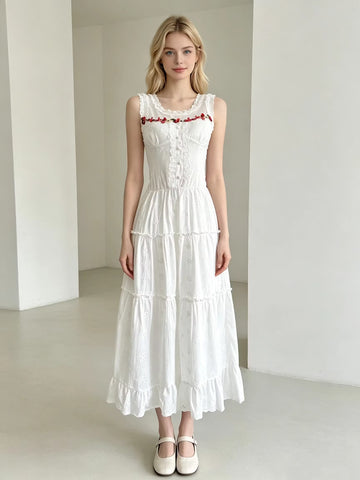 White sleeveless maxi dress with floral embroidery and lace details